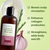 Onion & Rosemary Shampoo bottle with green background and text highlighting benefits