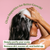 Person washing hair with shampoo on a pink background