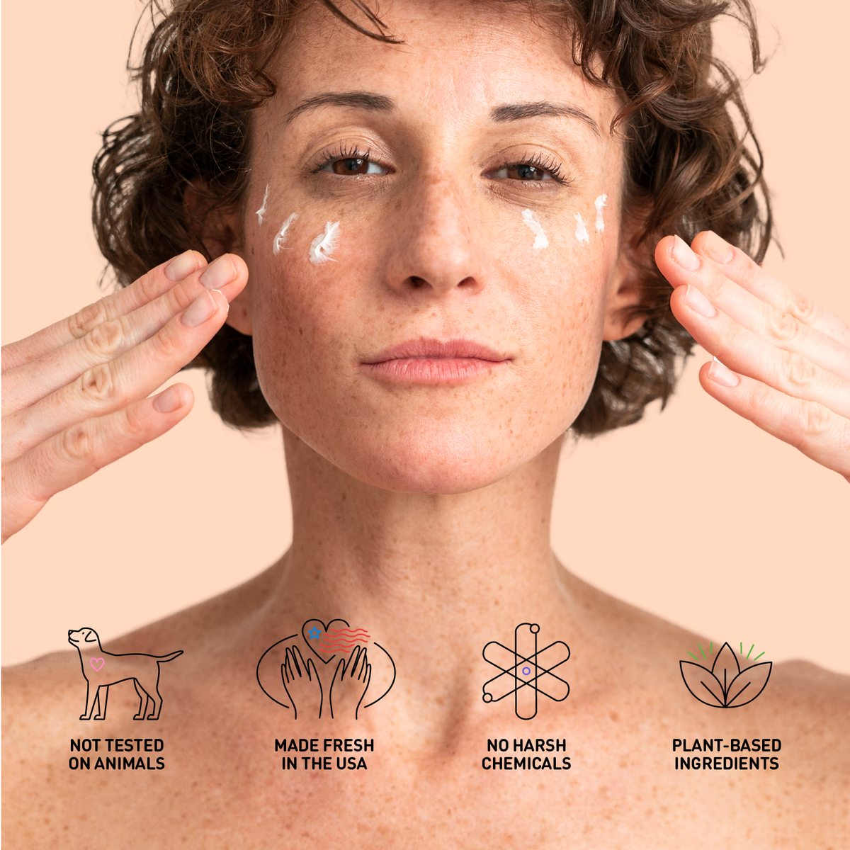 Woman applying cream to her face with icons indicating cruelty-free, made fresh, no harsh chemicals, and plant-based ingredients.