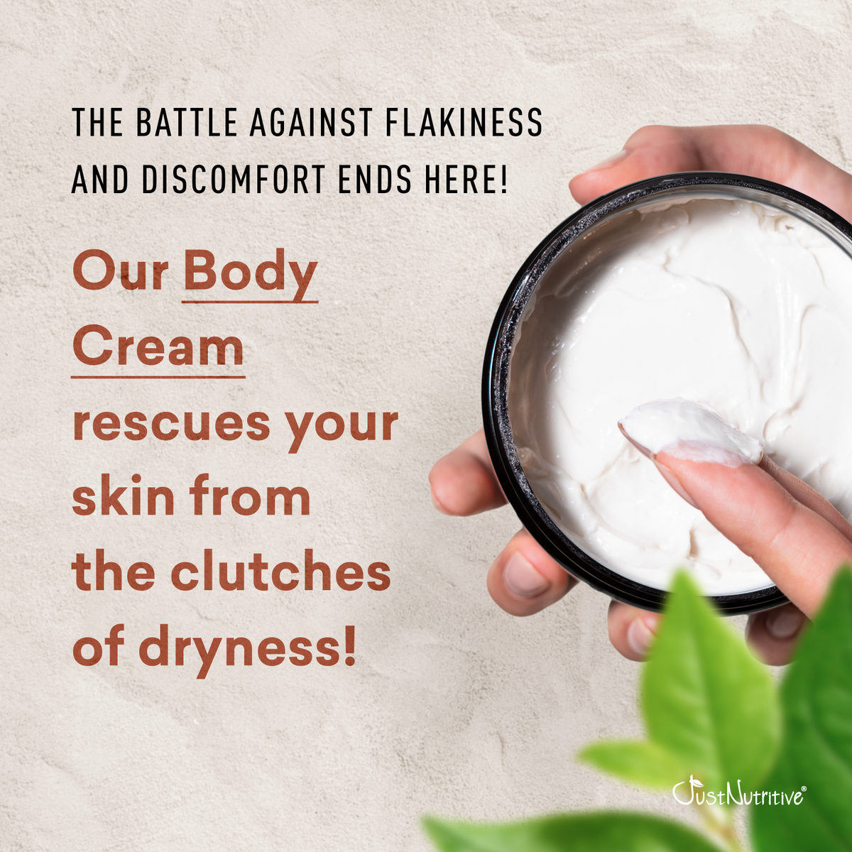 Hand holding a container of body cream with promotional text on a light background