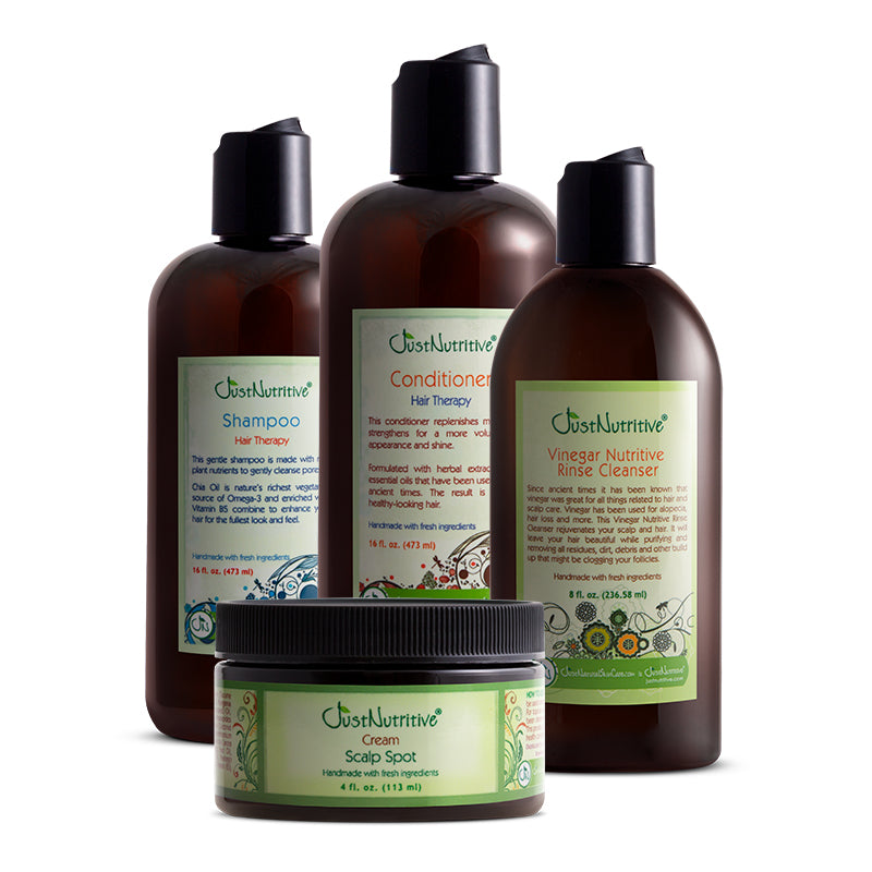 Set of Just Nutritive hair care products including shampoo, conditioner, rinse cleanser, and cream on a white background.