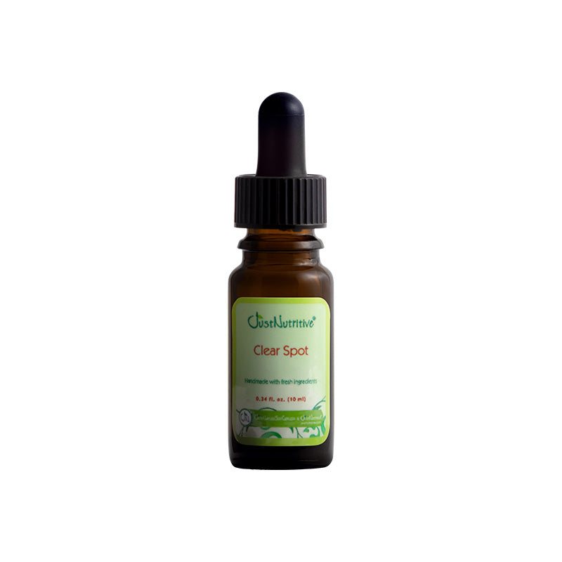 Bottle of Clear Spot with a dropper on a white background