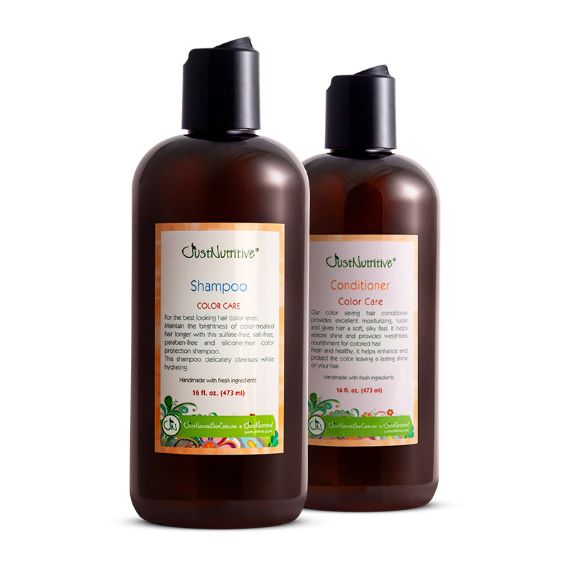 Two bottles of OshKoshB'Gosh shampoo and conditioner on a white background