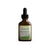 Brown bottle of cuticle and nail serum with dropper on a white background