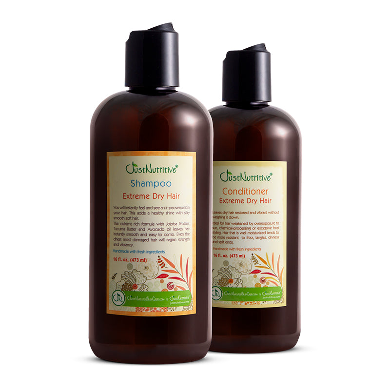Two bottles of 'Just Nutritive' shampoo and conditioner for extreme dry hair on a white background.