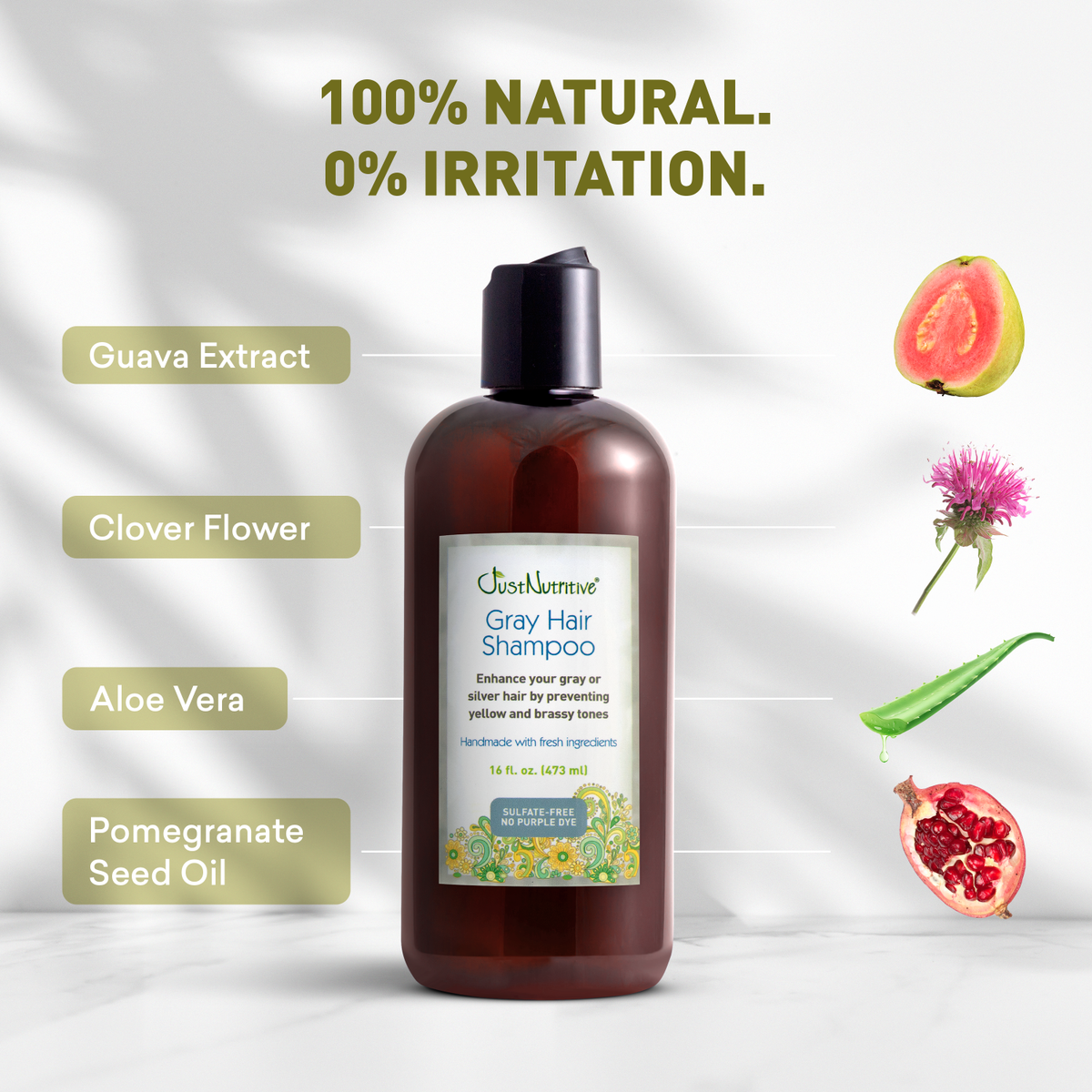 Gray hair shampoo bottle with natural ingredients on a white background