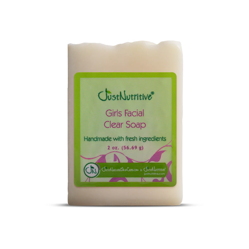 Bar of soap with a green label on a white background