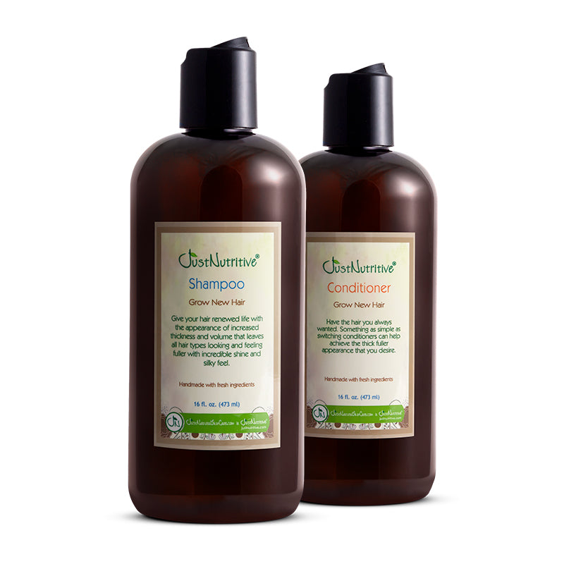 Two bottles of Just Nutritive shampoo and conditioner on a white background