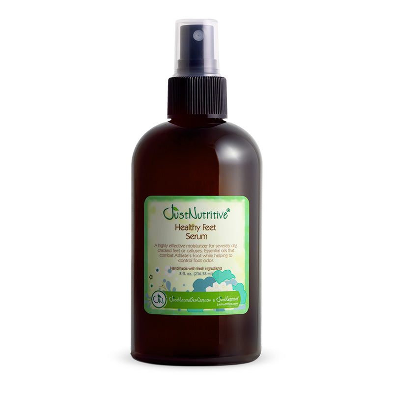 Brown bottle of 'Healthy Feet Serum' with a green label on a white background