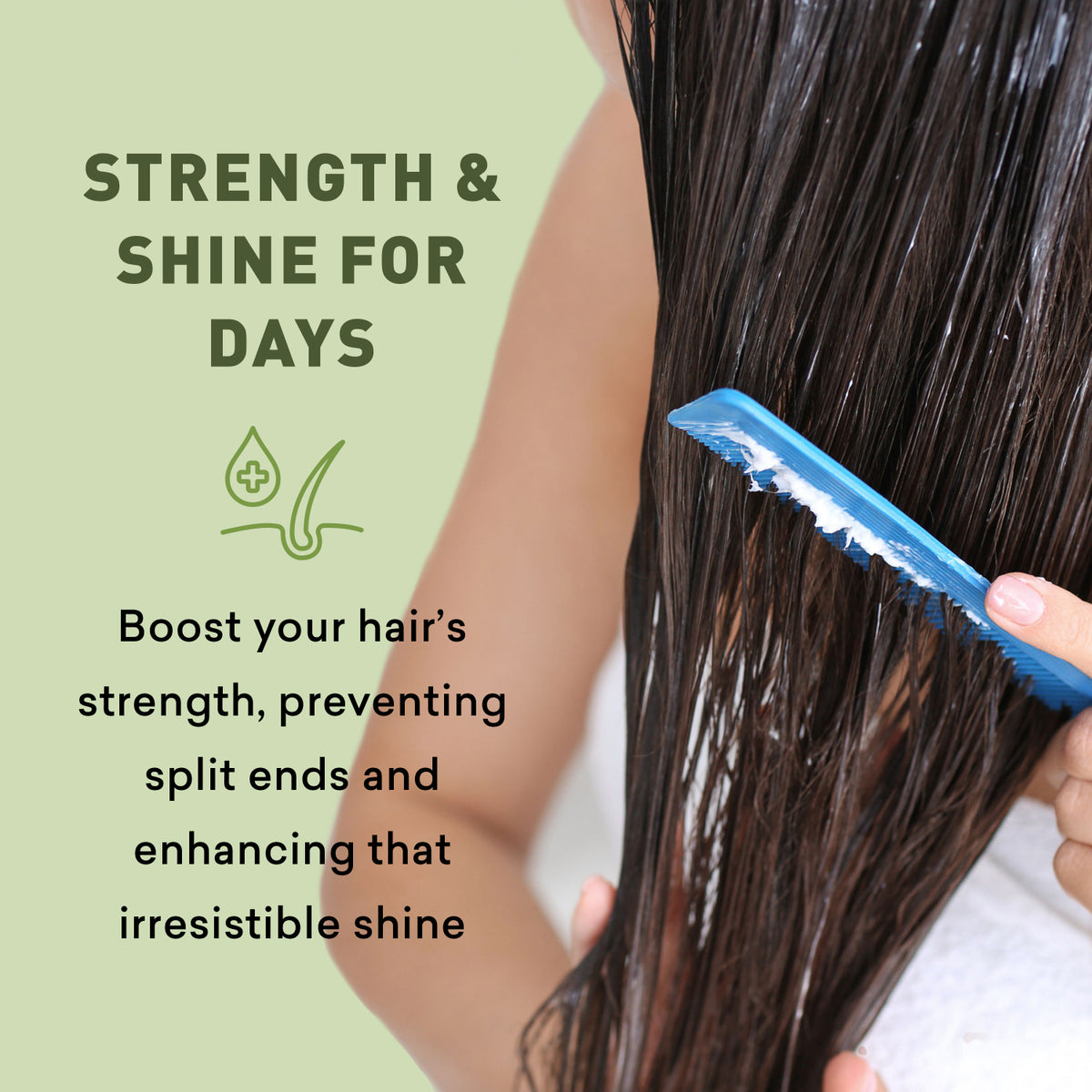 Person brushing long hair with a blue brush on a light green background, promoting hair strength and shine.