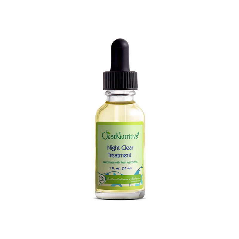Bottle of Night Clear Treatment with a dropper on a white background