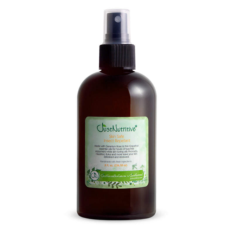 Brown spray bottle with a green label on a white background