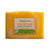 Yellow bar of soap with a label on a white background
