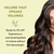 Woman with voluminous hair on a light green background with text about hair volume product.