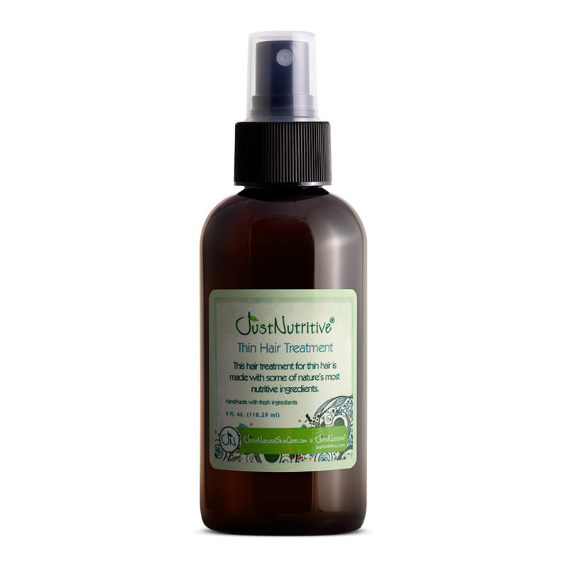 Brown spray bottle with a green label on a white background