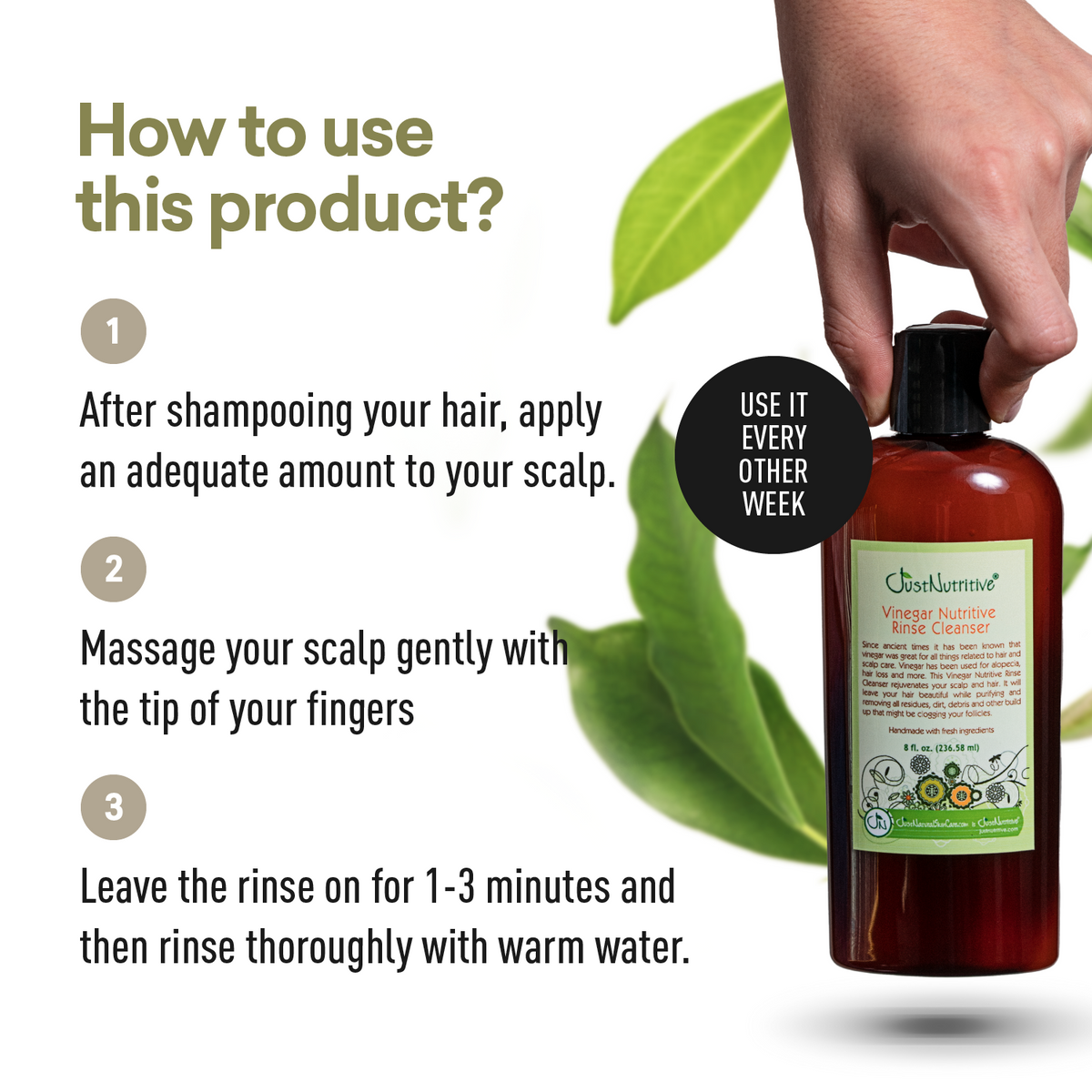 Bottle of hair care product with usage instructions and a hand holding it.