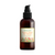 Brown hair treatment bottle with a label on a white background