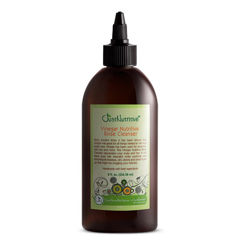 Brown bottle of Just Nutritive Vinegar Nutritive Rinse Cleanser on a white background
